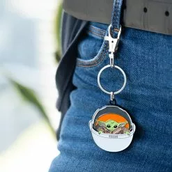 SalesOne LLC Star Wars: The Mandalorian The Child Keychain Pendant | Baby Yoda In Carriage -Bioworld Shop SOI SWMANYODAKC02 CE